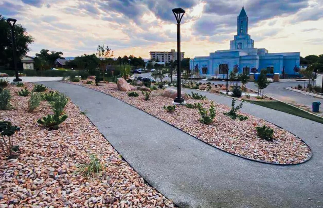 Pathways and rock mulch planting beds across the grounds